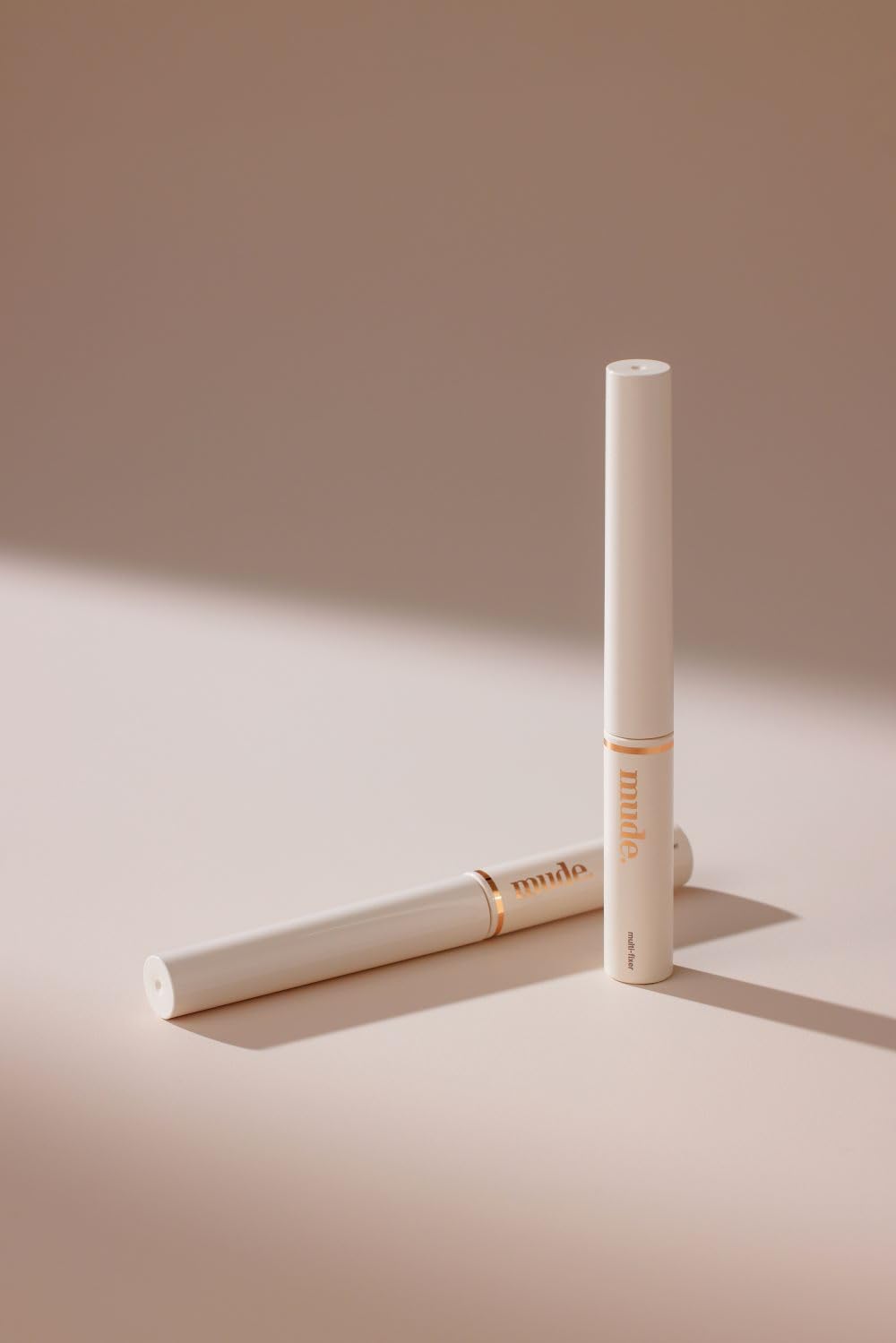 mude Inspire Skinny Curling Mascara packaging and ergonomic design