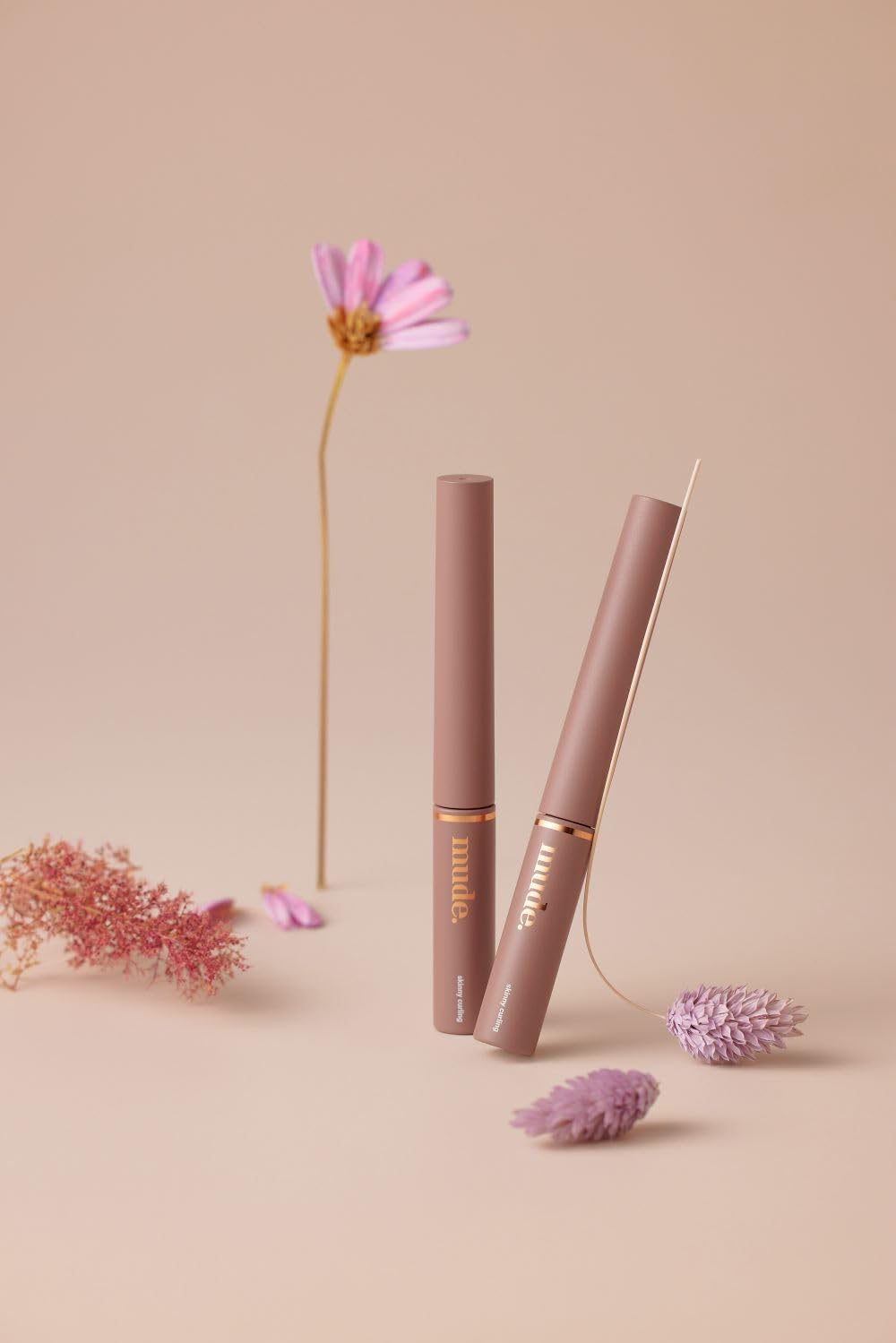 mude Inspire Skinny Curling Mascara waterproof test showing smudge-proof performance