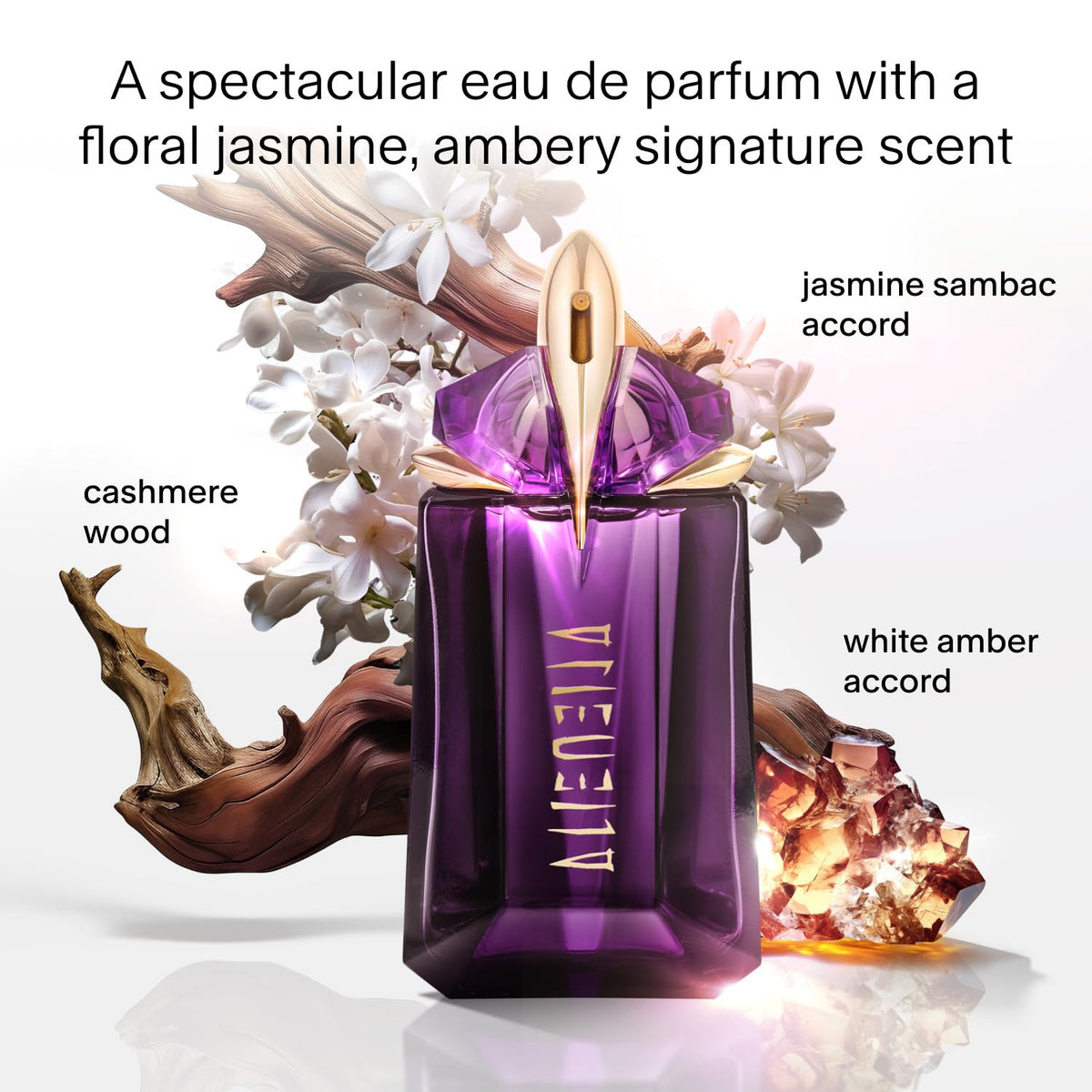 Mugler Alien Eau de Parfum bottle close-up highlighting jasmine and amber notes.