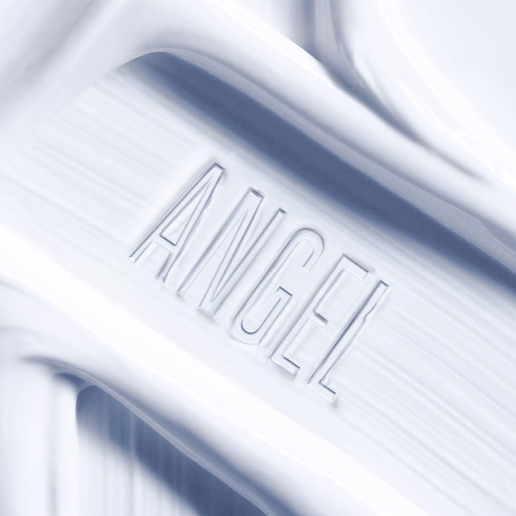 Close-up of the creamy texture of Mugler Angel Body Cream for lasting moisture.