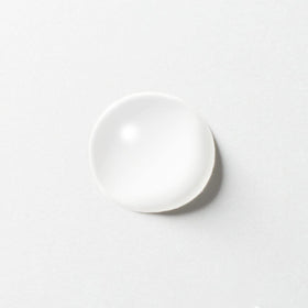 MUJI Mild Cleansing Oil close-up of ingredients and emulsification action for clean skin.