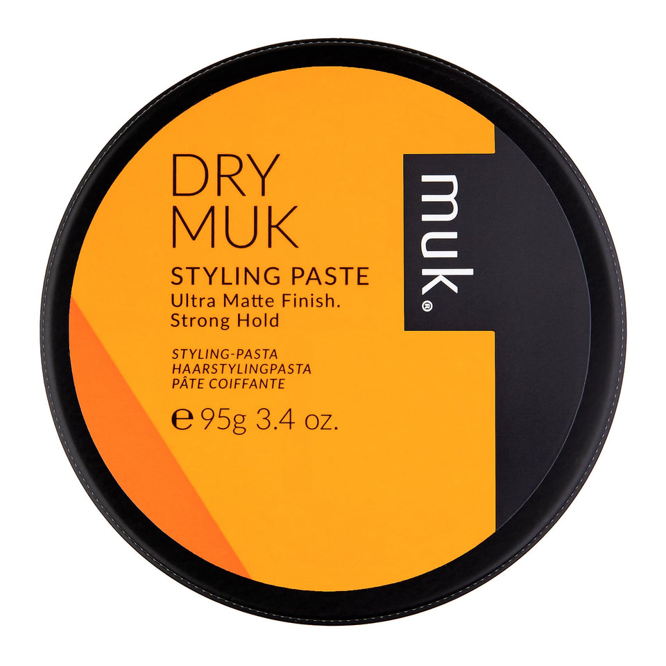 MUK Haircare Dry Ultra Matte Styling Paste packaging shows compact jar for travel styling.