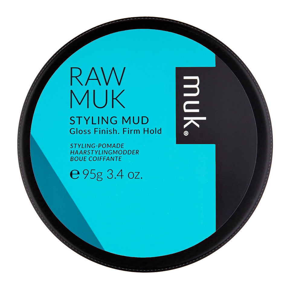 MUK Haircare Raw Styling Mud jar close-up showing rich clay texture for firm hold.