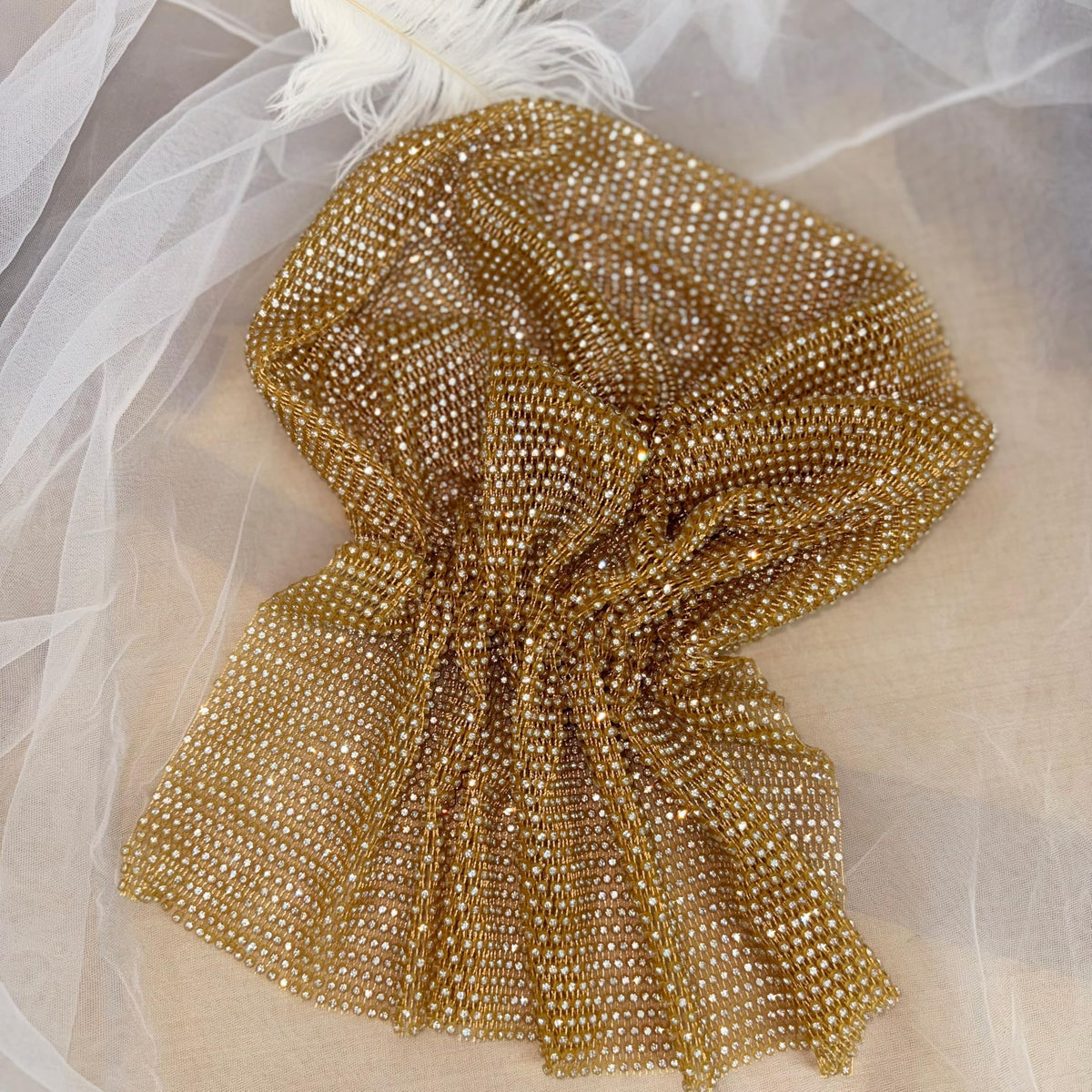 Munyee Hua gold headband elastic fit ensures secure comfort during events