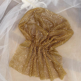 Munyee Hua gold headband elastic fit ensures secure comfort during events