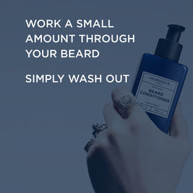 Creamy texture of Murdock London beard conditioner placed on the hand