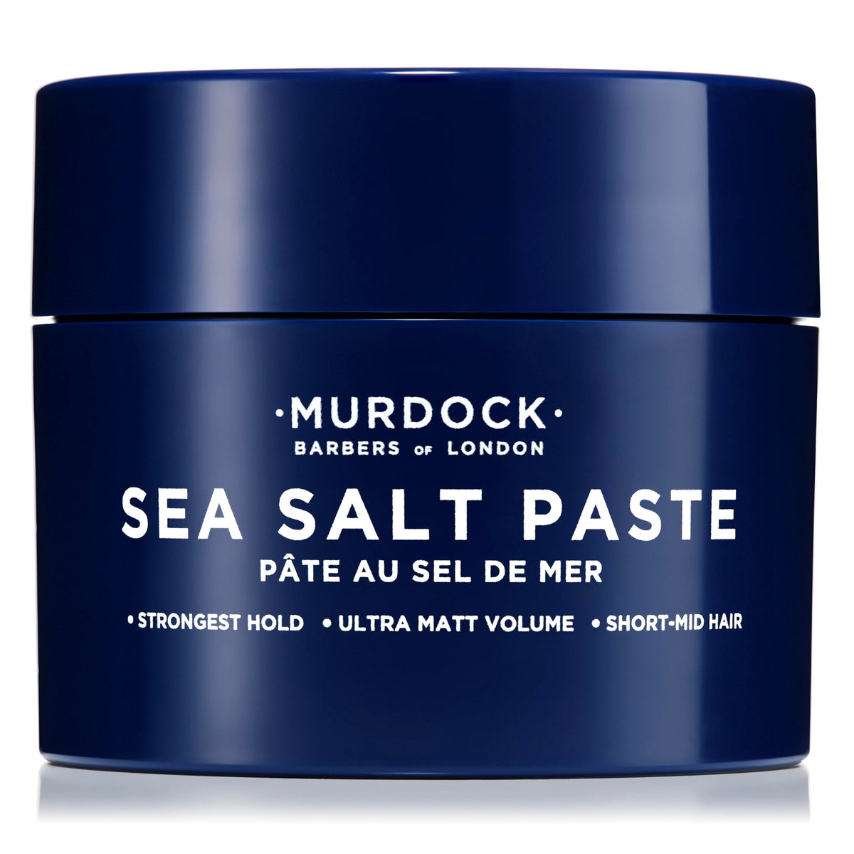 Murdock London Sea Salt Paste hands-dispense demonstrates easy product warm-up for even application