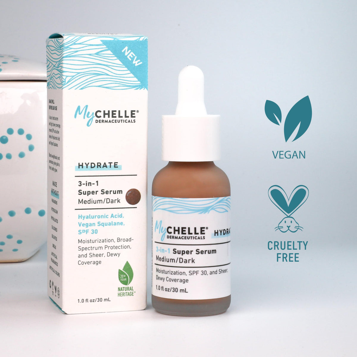 MyCHELLE Medium/Dark 3-in-1 Serum swirl on skin illustrates sheer coverage and hydration.