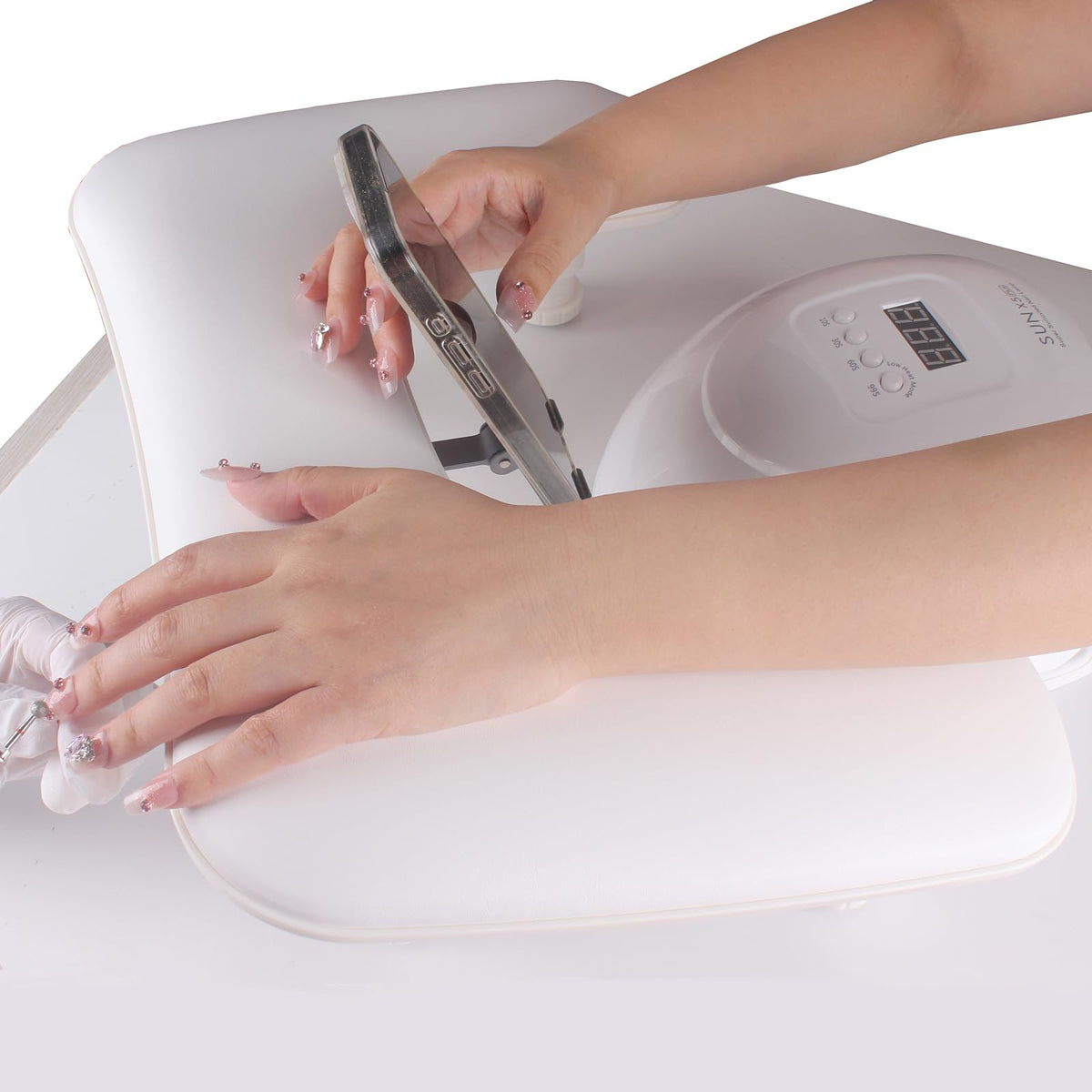 MZCMSL U-shaped white hand rest provides comfortable support during nail sessions.
