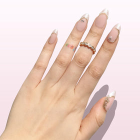 Nail Reformation glossy finish close-up highlights luxe, durable look.