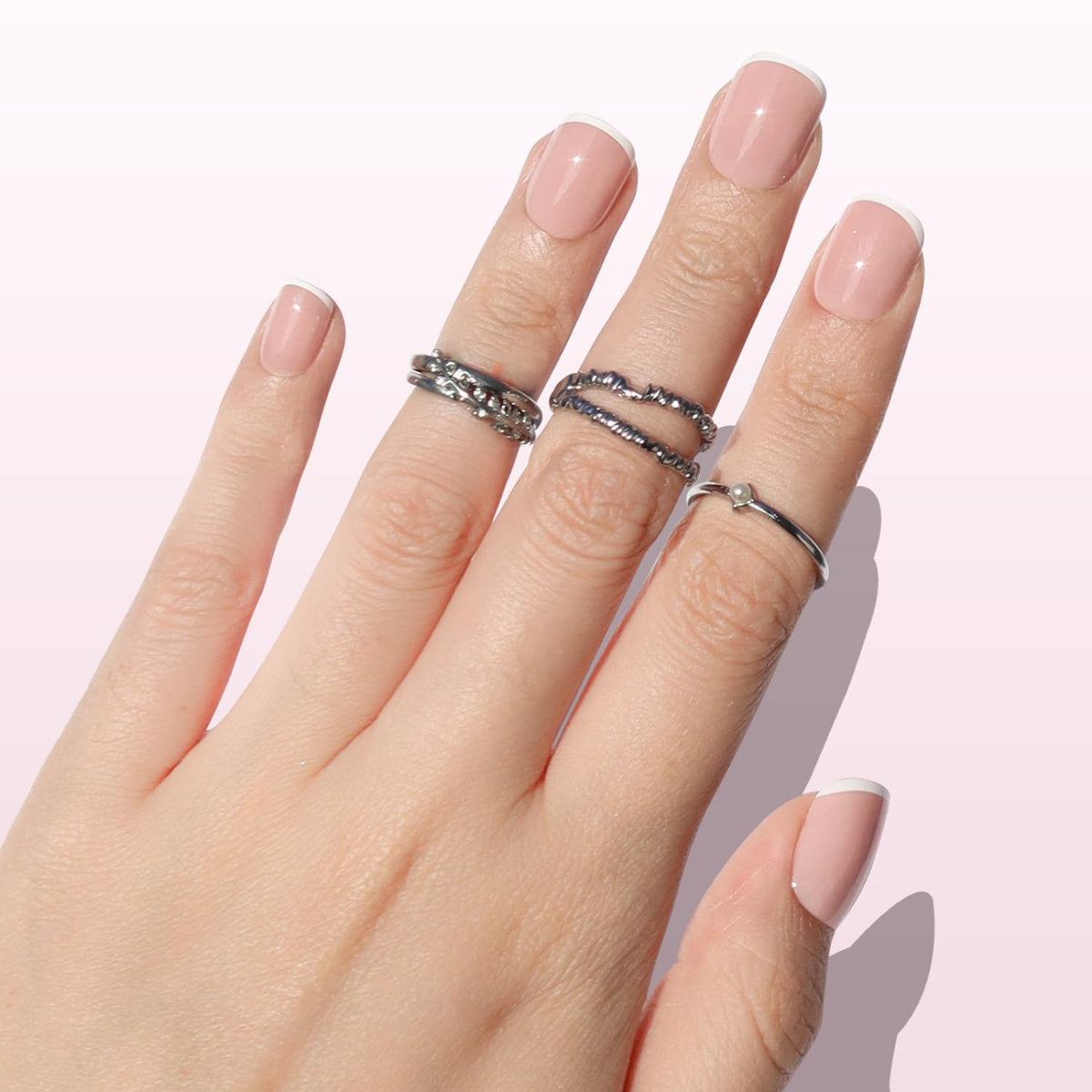 Thirty nails in fifteen sizes laid out for a natural, customized fit.