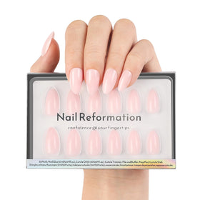 Nail Reformation soft pink short almond nails in glossy finish for durable wear.