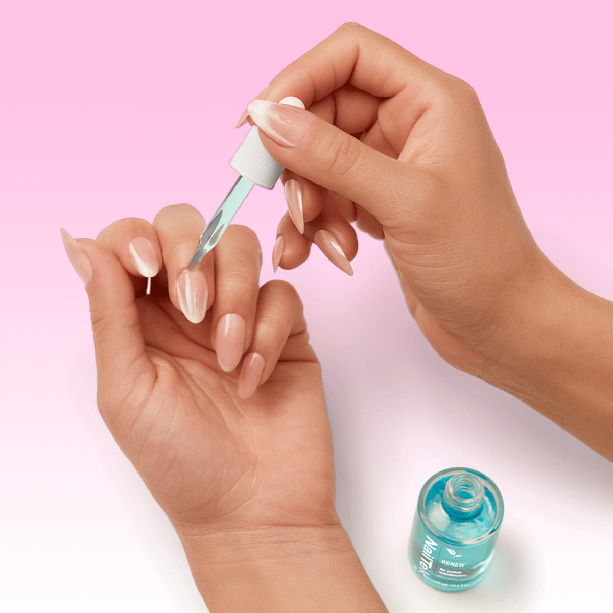 Nail Tek Therapy Kit in use during manicure routine for healthier-looking nails