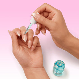 Nail Tek Therapy Kit in use during manicure routine for healthier-looking nails