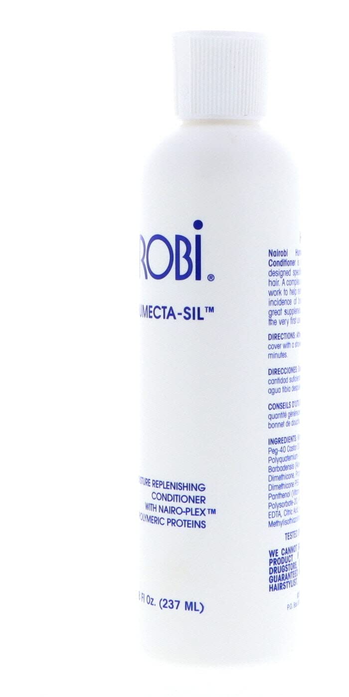 Nairobi Humecta-Sil hair coating close-up reveals creamy texture for deep moisturization.