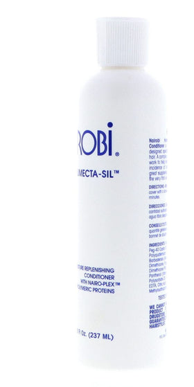 Nairobi Humecta-Sil hair coating close-up reveals creamy texture for deep moisturization.