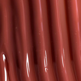 Naked Sundays Poutscreen can be worn solo or layered over lipstick for shine.