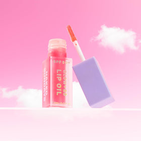 Naked Sundays SPF 50 Glow & Go Lip Oil Watermelon application offers smooth, non-sticky lips with a tint.
