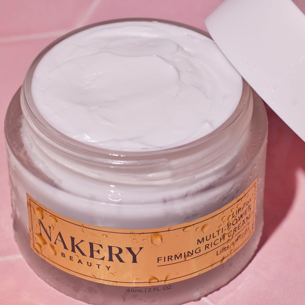 Nakery Lift-Tox jar close-up illustrates rich cream for crepey skin comfort.