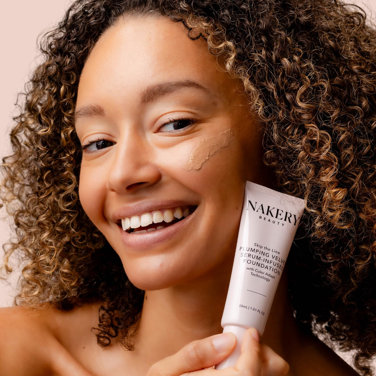 Nakery long-lasting coverage shows all-day wear without caking.