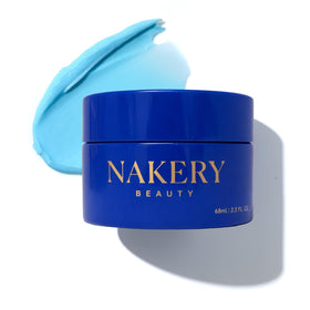 Nakery Night Shift cream tube close-up highlighting silky texture for nighttime care.