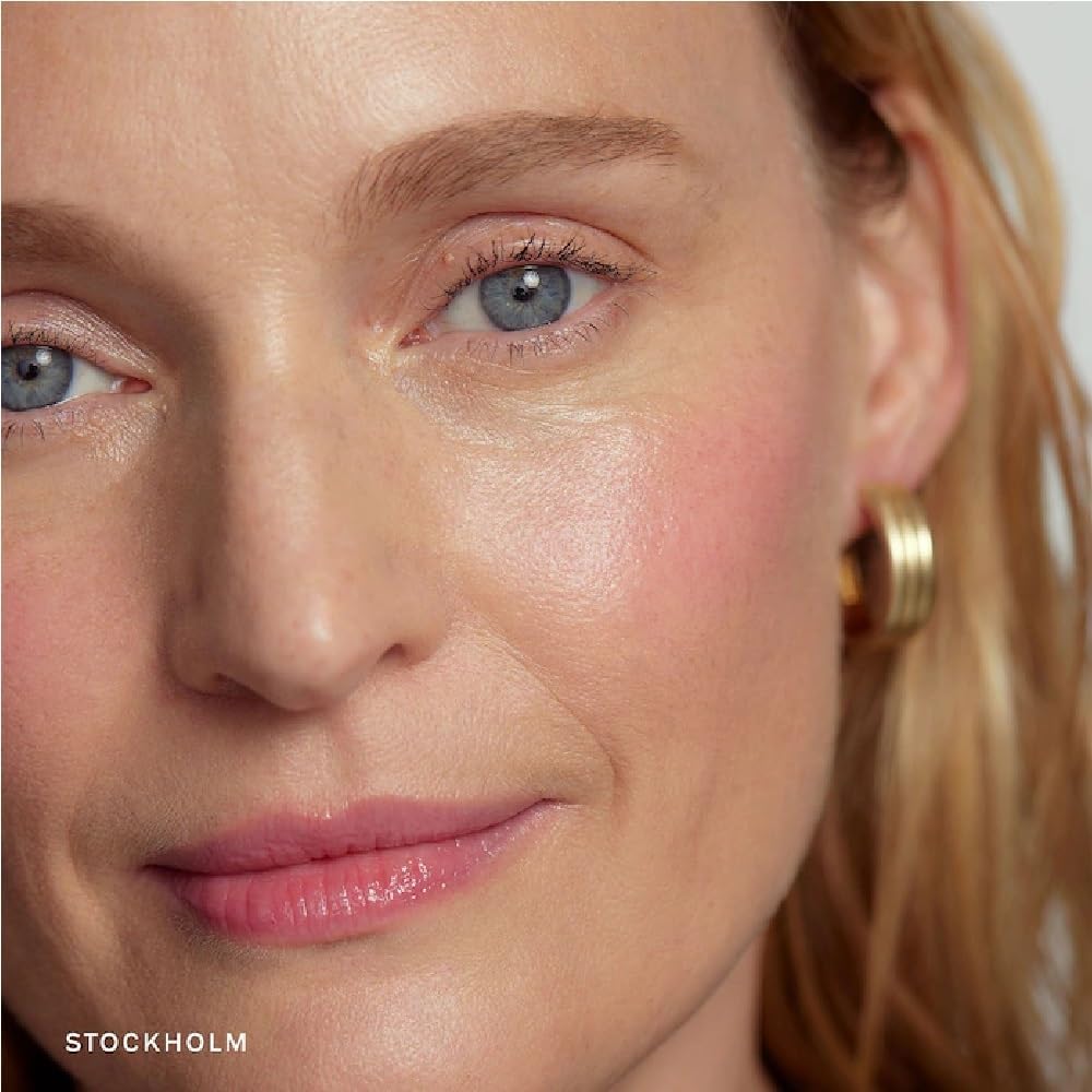 NAPH M Flush Balm on lips for subtle color and smooth look