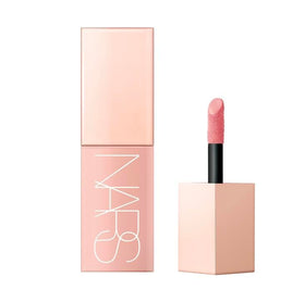 NARS Afterglow Brazen cheek swatch demonstrates buildable color with a natural radiant finish