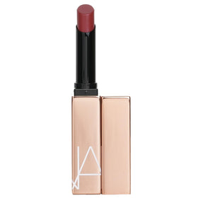 NARS Afterglow Lipstick Turned On swatches show radiant color with depth.