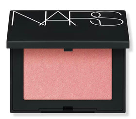 NARS Orgasm refillable blush compact in peach-pink-gold delivering long-lasting color.