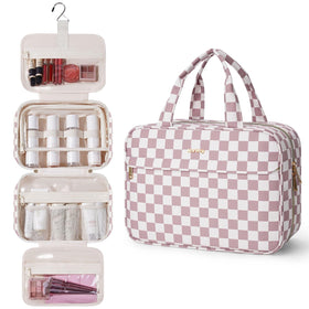 Narwey hanging toiletry bag in dusty pink checkered, open to reveal organized compartments