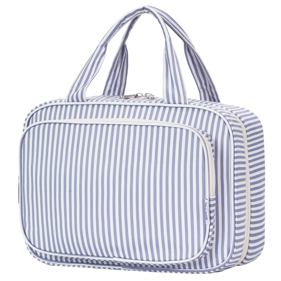 Narwey striped travel toiletry bag in greyish blue hanging for easy access.