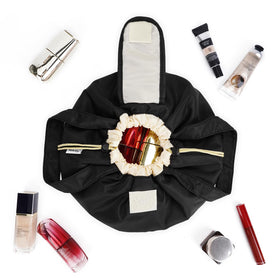 Narwey water-resistant fabric with padded lining protecting skincare and cosmetics.