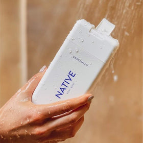 Native Body Wash bottle pour—smooth, controlled dispensing in shower.