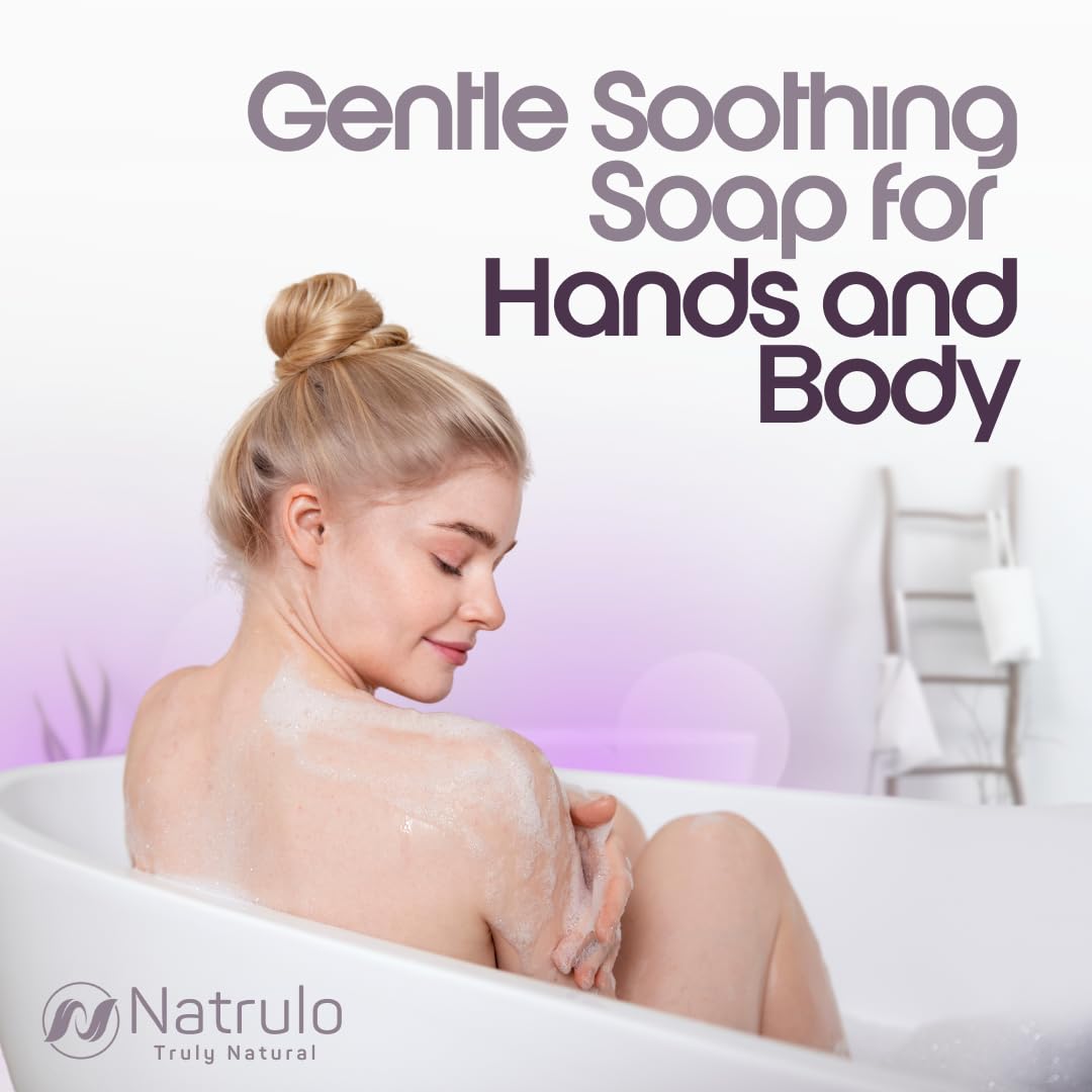 Natrulo eczema soap bar beside hands, ready for daily use.