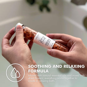 Natural Amor Los Angeles bath salts jar close-up with dried flowers for a spa-like moment.