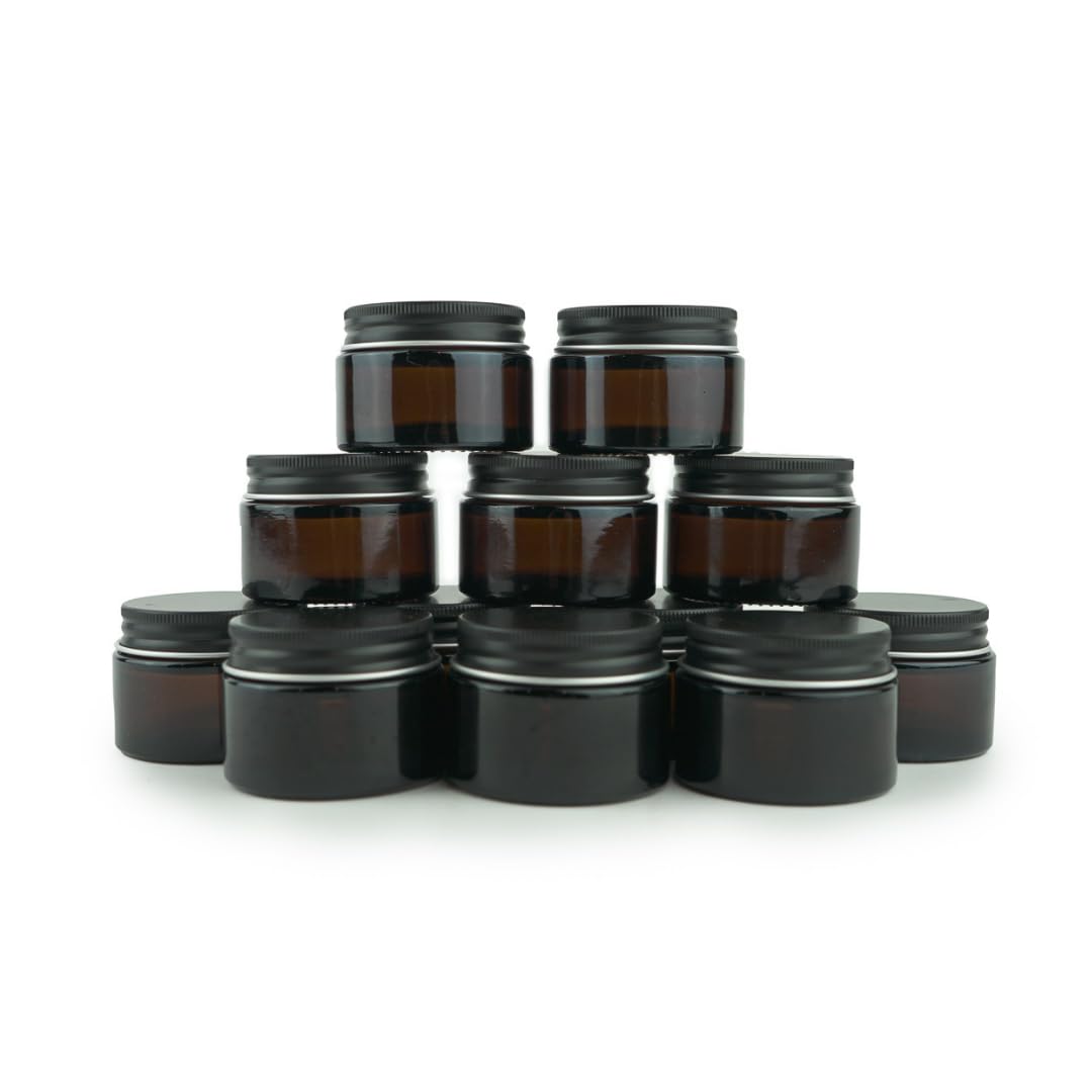 Nature Packaged amber jar with black lid, travel-friendly cosmetic container.