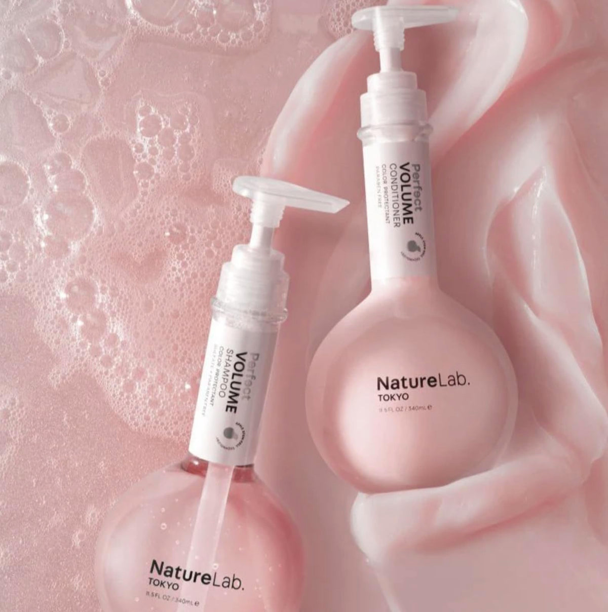 NatureLab.TOKYO Perfect Volume Conditioner bottle demonstrates glide for smoother, fuller hair.