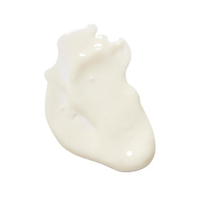 Naturopathica Chamomile Cleansing Milk being massaged onto the face for daily use.