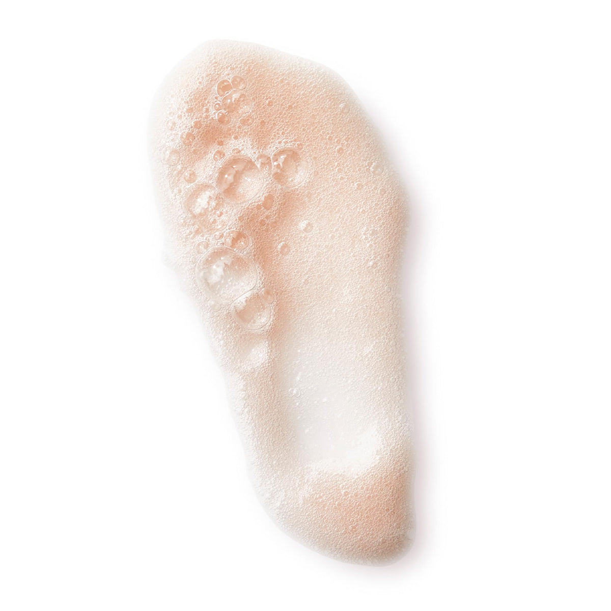 Naturopathica cleanser texture close-up showing gentle foam.