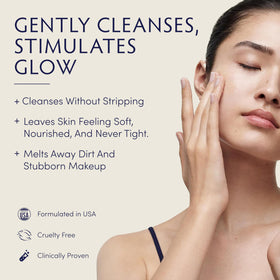 Naturopathica Manuka Honey Cleansing Balm on fingertip; rich texture melts makeup and impurities.