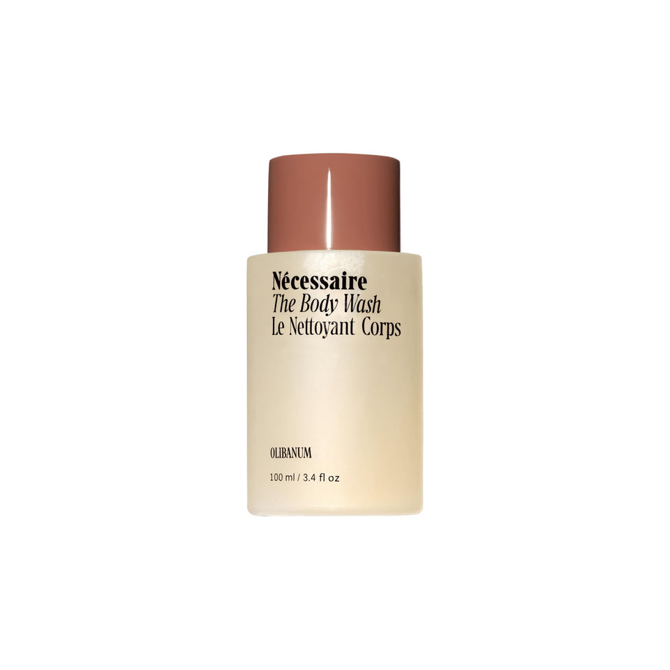 Nécessaire Olibanum body wash bottle with eco-friendly packaging for daily cleansing.