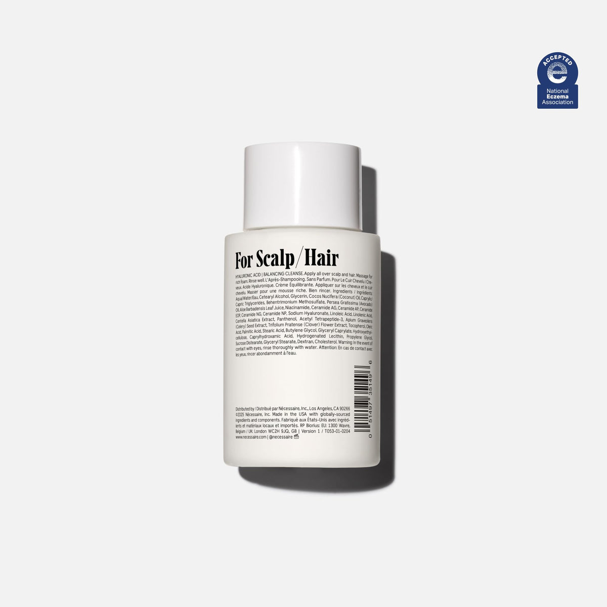 Nécessaire The Conditioner Mini product application shot shows detangling for smoother hair.