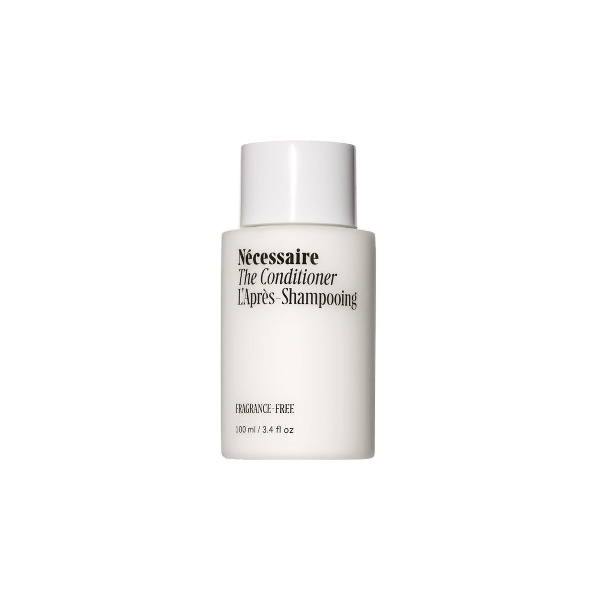 Nécessaire The Conditioner Mini bottle closeup highlights fragrance-free formula for sensitive scalps.
