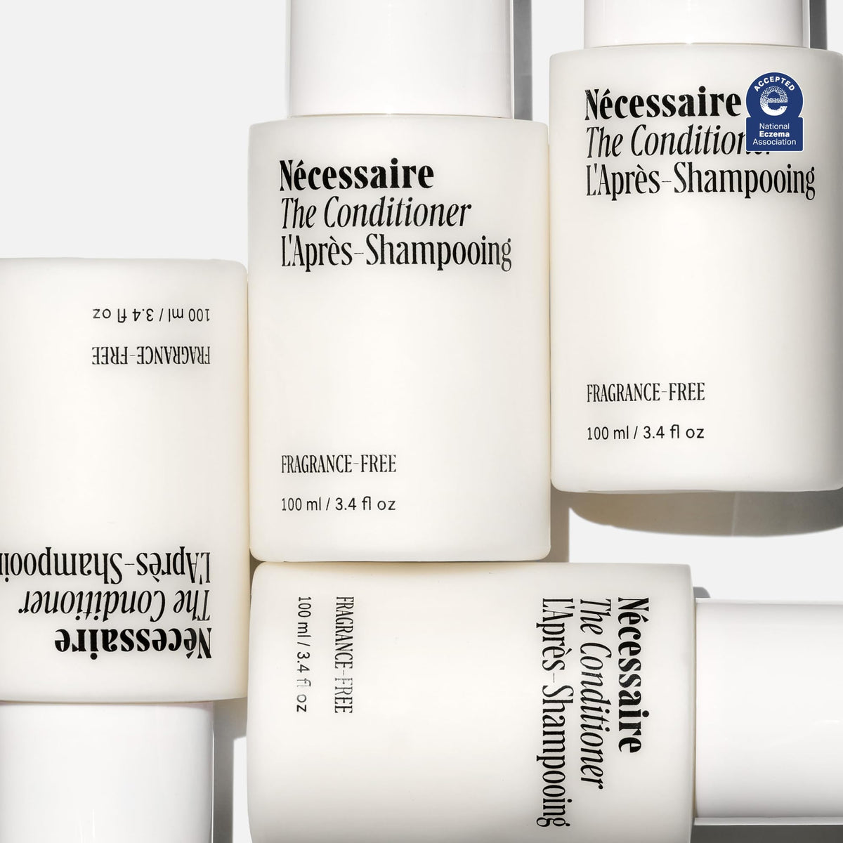 Nécessaire The Conditioner Mini hyaluronic acid focus emphasizes scalp hydration.