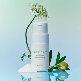 Needly powder foaming into a light lather for gentle cleansing