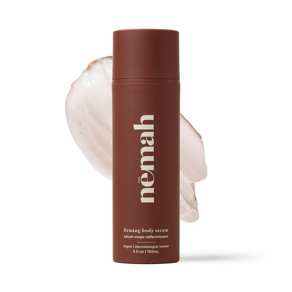 Nemah Firming Body Lotion bottle close-up with pump, showcasing premium packaging and smooth application.