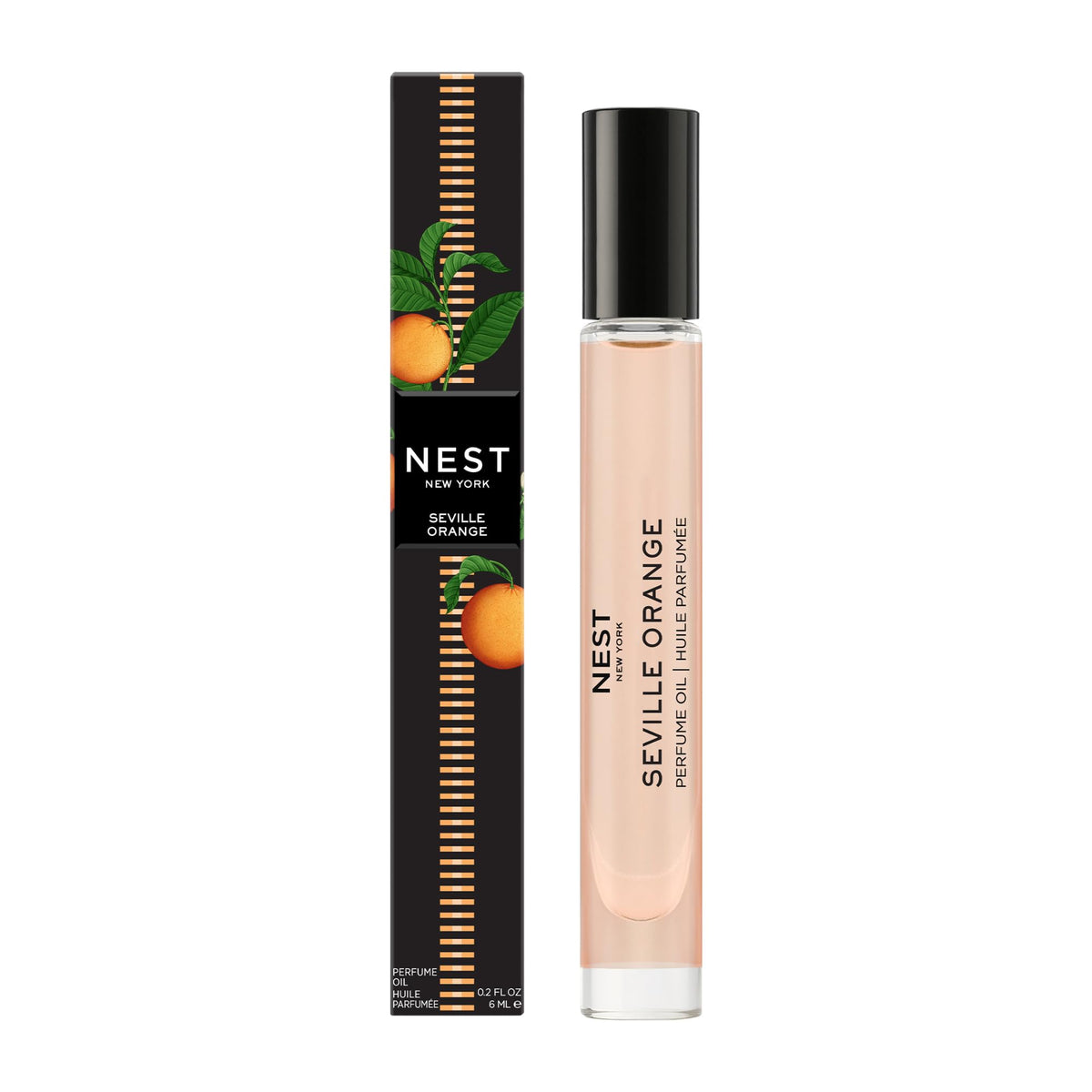 NEST New York Seville Orange perfume oil rollerball on a blush glass vessel for a sleek scent experience.