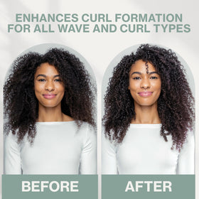 Hands smoothing NEUMA Neu Curl Perfecting Creme into damp hair.