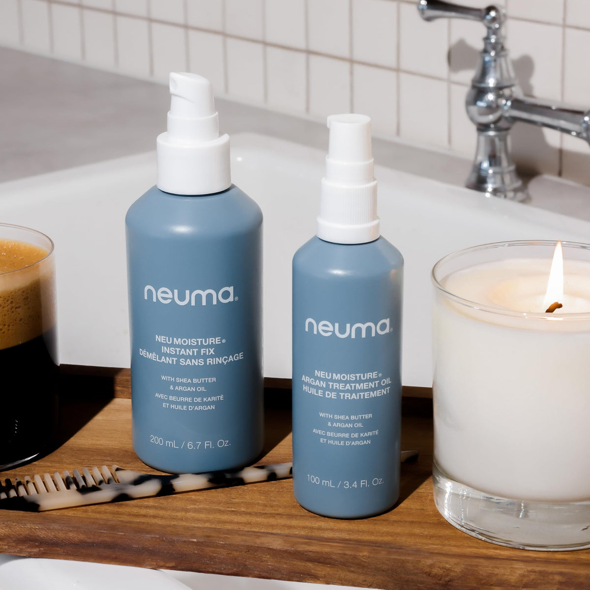 Travel-ready Neuma Neu Moisture Argan Treatment Oil bottle for on-the-go care.