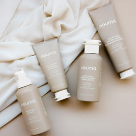 NEUMA Neu Styling Mousse green-tea-caffeine aids scalp balance during styling.
